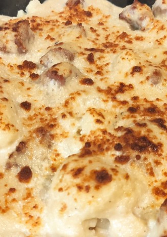 Una foto de Coliflor gratinada con butifarra
