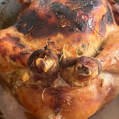 A picture of Golden stuffed chicken.