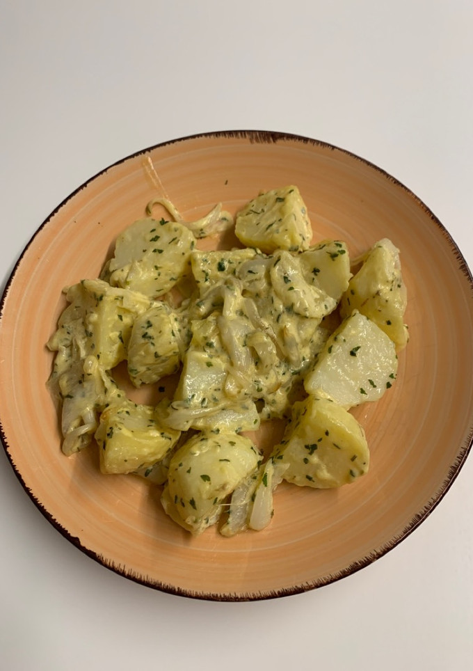 Una foto de Patatas salseadas