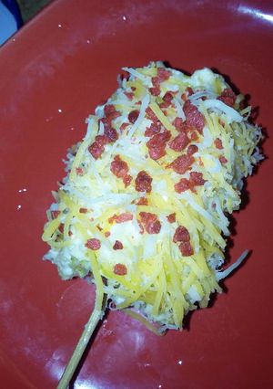 Una foto de Mazorcas con queso