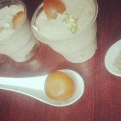 A picture of Gulab jamun mousse with White chocolate.