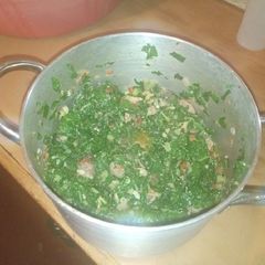A picture of Spinach with pork.