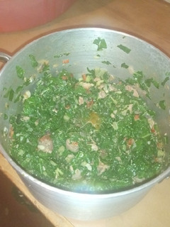 A picture of Spinach with pork.