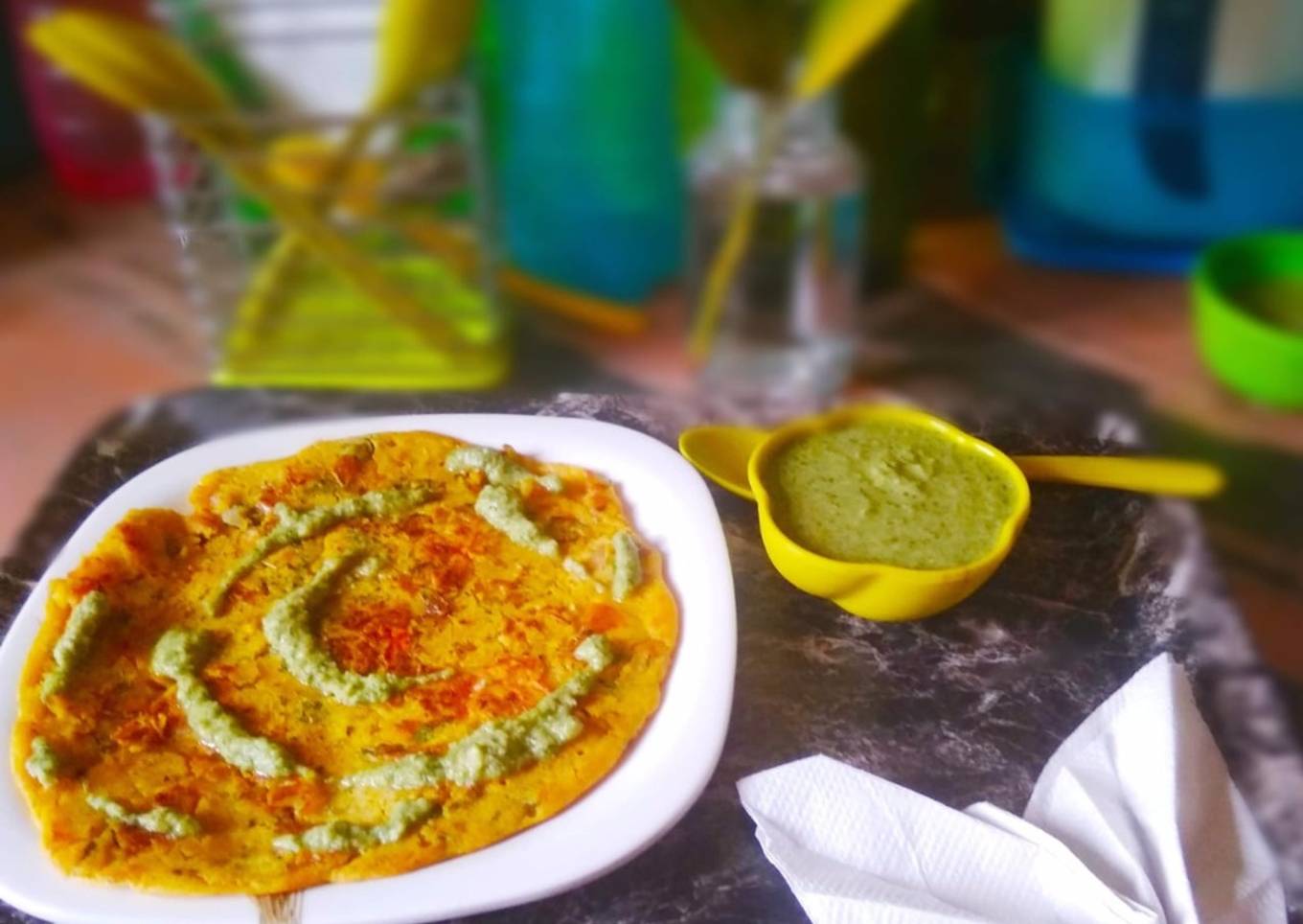 Chickpea flour pancakes with tomato sauce and mint peanuts
