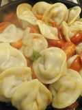Agnolotis de berenjenas y pimientos asados
