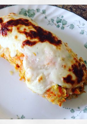 Una foto de Rollo de papa y zanahoria relleno de jamón y queso crema