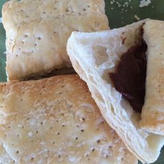 A picture of Chocolate stuffed puff pastry.
