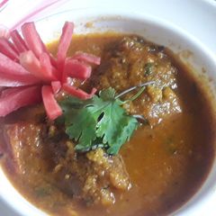 Fish egg with palak A picture of Fish egg with palak.