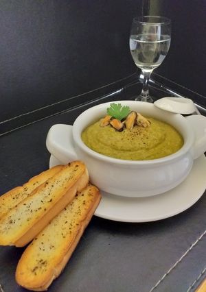Una foto de Crema de zapallo asado con choritos