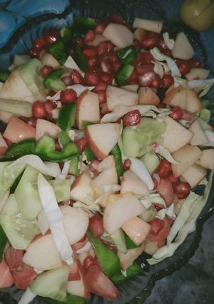 A picture of Fresh fruit and veggies salad.
