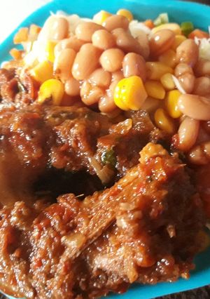 A picture of Salad and peppered chicken.