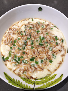 A picture of Steam Egg with Tiny Shrimps and Onion Leaves.