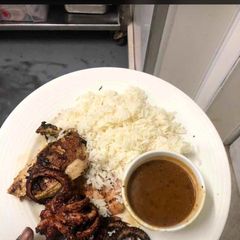 A picture of Rice and octopus ‘peppercon sauce ‘.