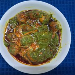 A picture of Palak Chicken Malai Kofta.