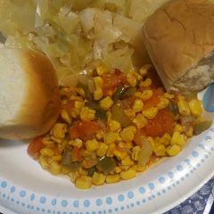 A picture of Maque Choux, Tomatoes and Corn.