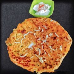 A picture of Aloo Cheese Paratha.