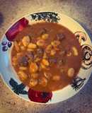 Gnocchi con carne guisada