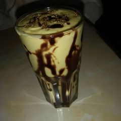 A picture of Avocado,mango,banana smoothie#touch of chocolate#4wkschallenge.