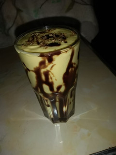 A picture of Avocado,mango,banana smoothie#touch of chocolate#4wkschallenge.