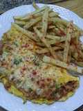 Chistorra con huevo, cebolla caramelizada y papas fritas