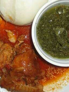 A picture of Stewed Chicken served with veges and Ugali.