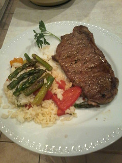 A picture of Garlic chili steak and warm rice salad.
