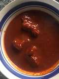 Costilla de puerco en salsa roja