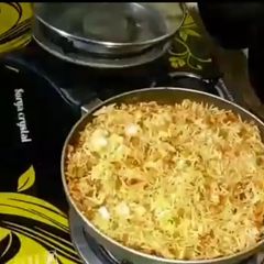 A picture of Schezwan Paneer Fried Rice.