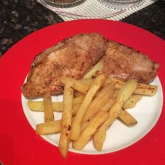 A picture of Sweet & Smoky pork chop with vegeta chips.