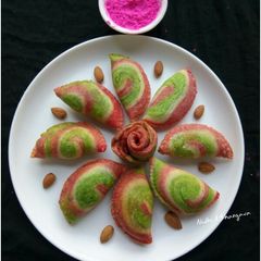 A picture of Colourful spiral Gujiyas.