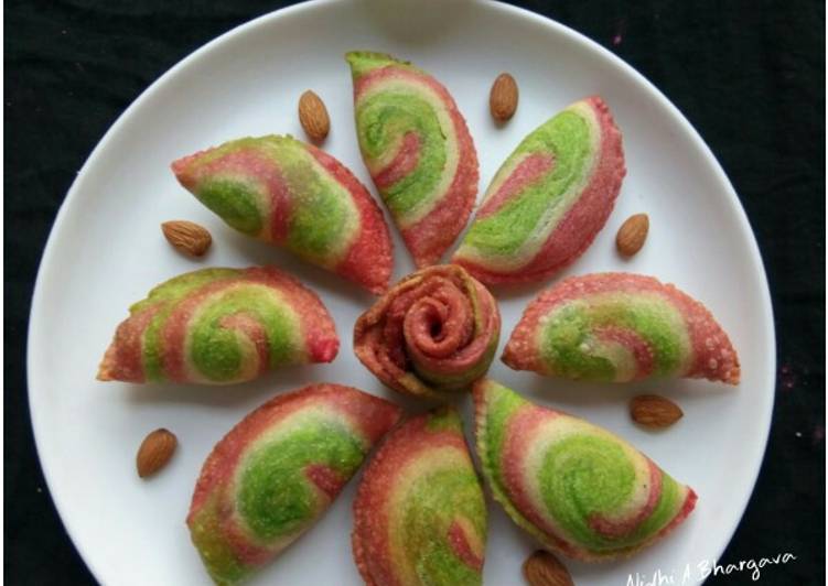 Colourful spiral Gujiyas