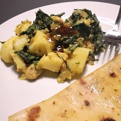 Vegan spinach, potato and bean dry curry A picture of Vegan spinach, potato and bean dry curry.