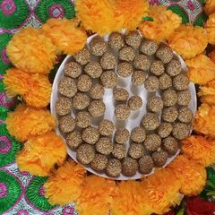 A picture of Jaggery and till ladoo.