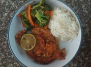 Una foto de pollo al limon en sarten