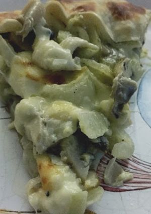 Una foto de Tarta de champignones y muzzarella