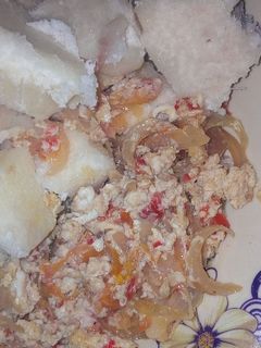 A picture of Boiled yam and egg sauce.