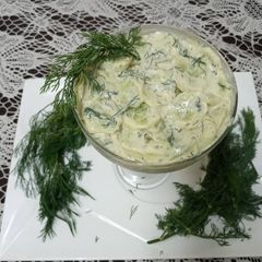 A picture of Cucumber selad with dill yoghurt dressing.