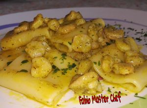 Foto di Paccheri con Pesto Fiori di Zucchine, Gamberi sfumati al Cognac