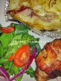 Rollo de lomito con tocino, papa rellena y ensalada de espinaca