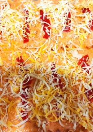 Una foto de Canelones de brandada de bacalao con salsa de piquillos