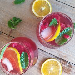A picture of Berry, lemonade, ginger ale and vodka punch.