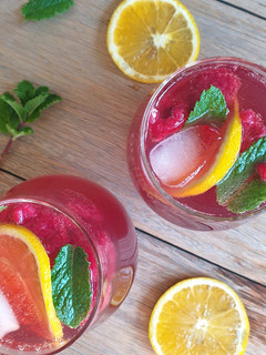 A picture of Berry, lemonade, ginger ale and vodka punch.
