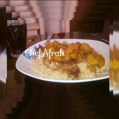A picture of Steamed cous cous and potatoes soup.