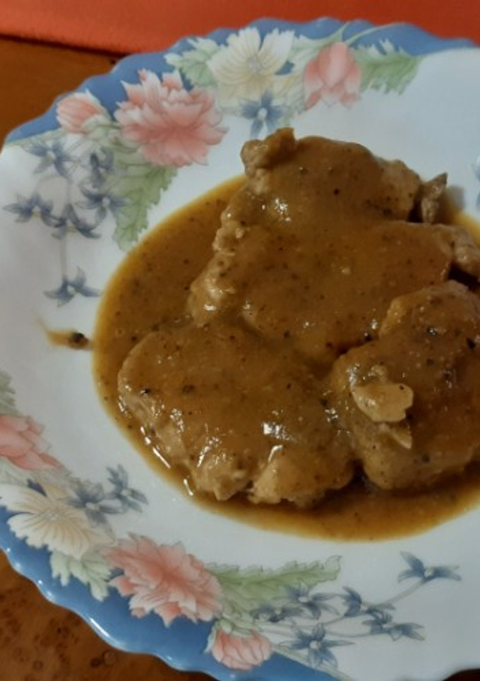 Una foto de Solomillo de cerdo en salsa ligera de pimienta