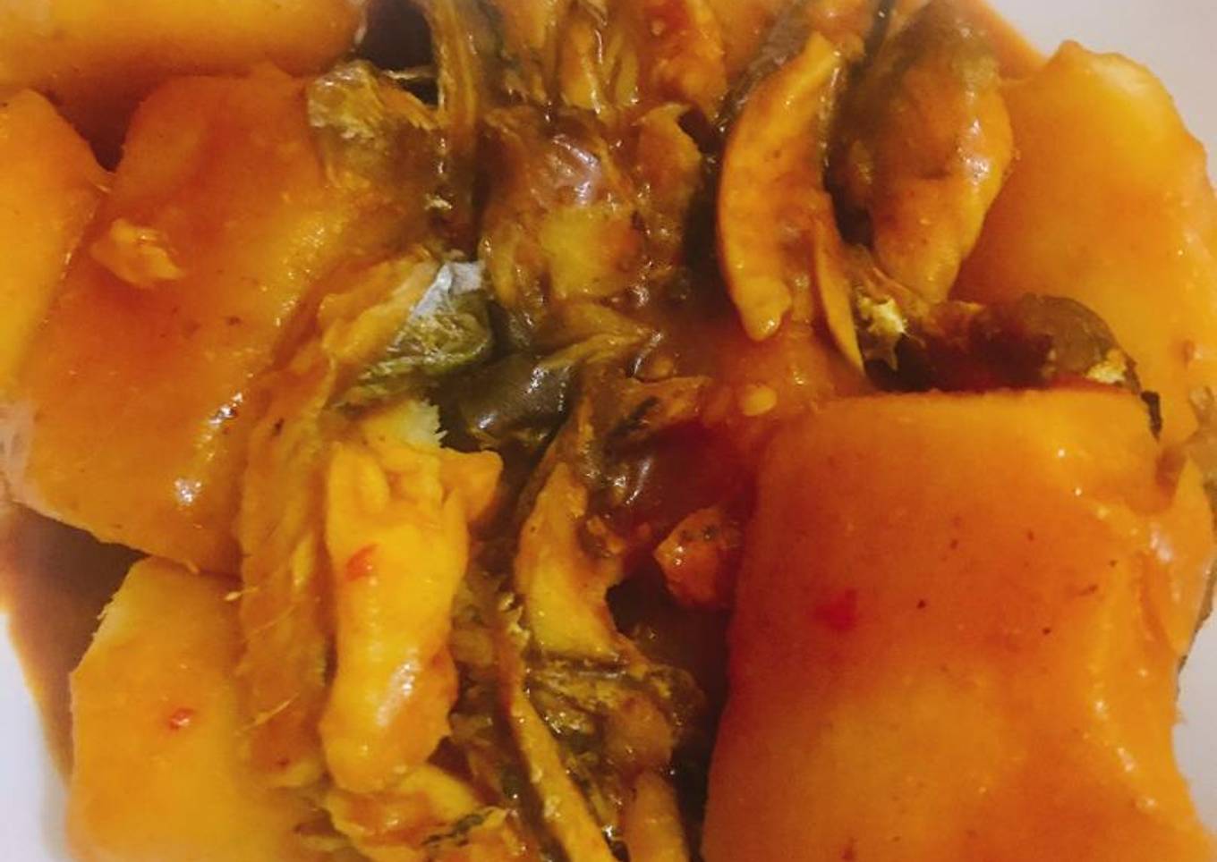 Yam porrige with smoked fish