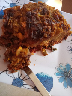 Una foto de Pastel de lentejas y puré de boniato y zanahoria caramelizados