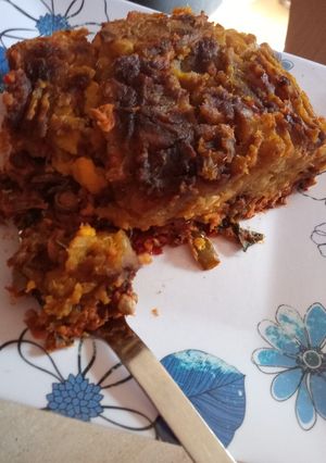 Una foto de Pastel de lentejas y puré de boniato y zanahoria caramelizados