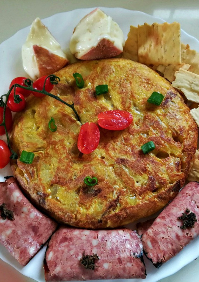 Una foto de Tortilla de patatas lujosa