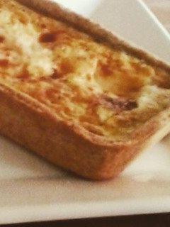 Una foto de Tarta integral de cebolla y queso