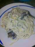 Spaghetti con pollo y champiñones